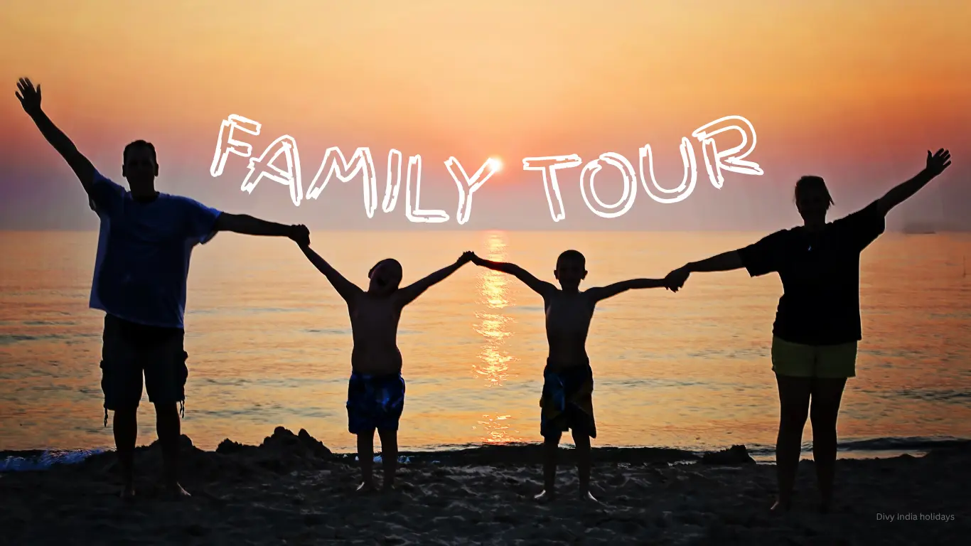 Family enjoying a sunset at the beach during a family tour.